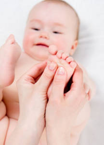 massaging baby's feet