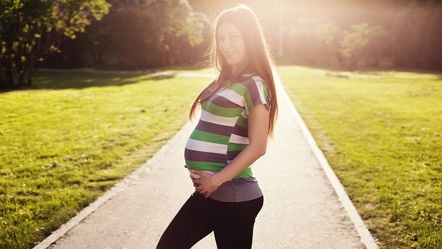 happy smiling pregnant mom