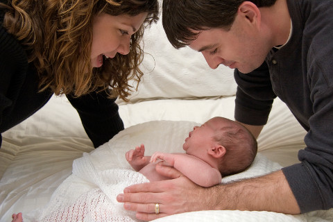 parents with their new baby