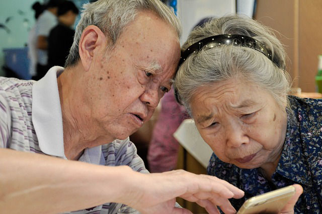 elderly learning to use mobile