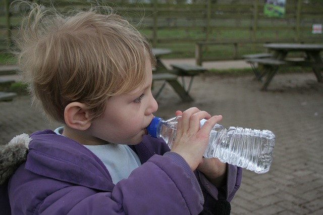 child drink water hydrate