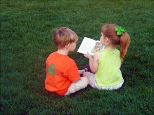 a boy a girl and a book