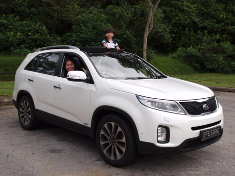 Mrs-Eng-and-Darius-in-their-Kia-Sorento-ride