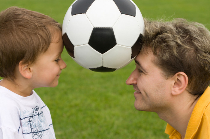 Father and son - Sunday soccer game portrait