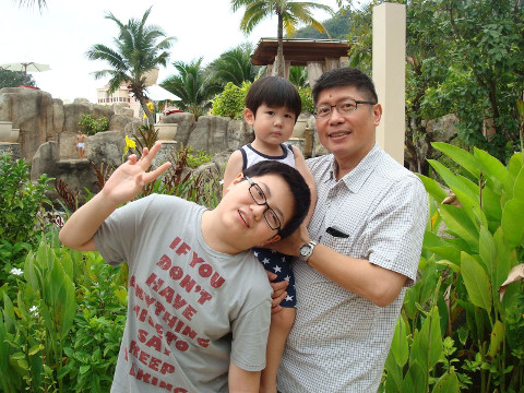 Mr Tan Wee Keng and his sons