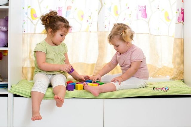 girls sisters playing together