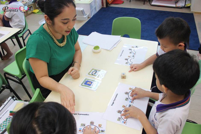 Teacher is teaching children