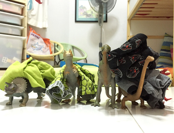 When Dinosaurs Come Alive At Night: Dinosaurs wearing PJs