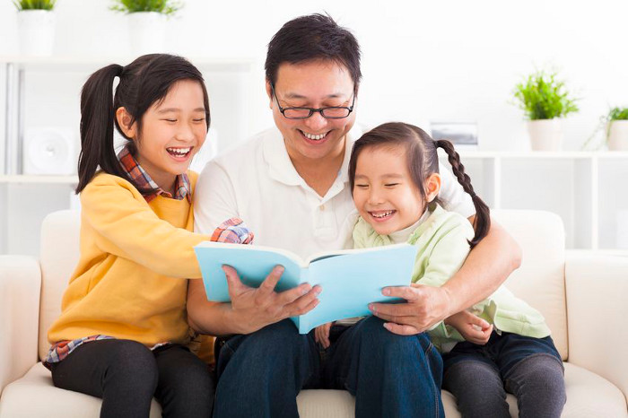 Parent and child reading together