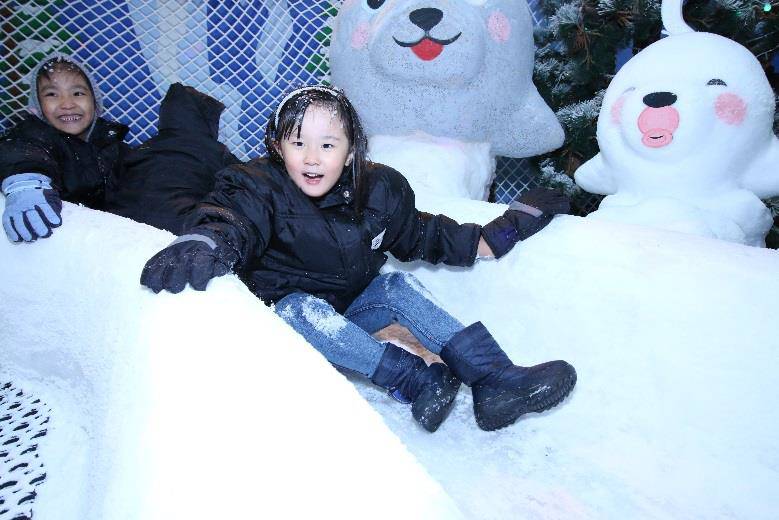 School children playing at Snow City Singapore Chipsley playground