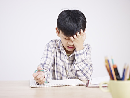 Boy frustrated while studying