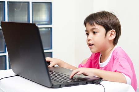 child using laptop