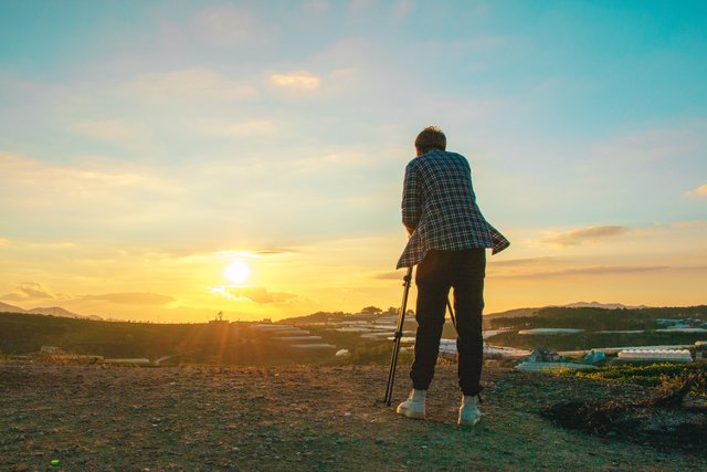 Taking photographs of the sunset