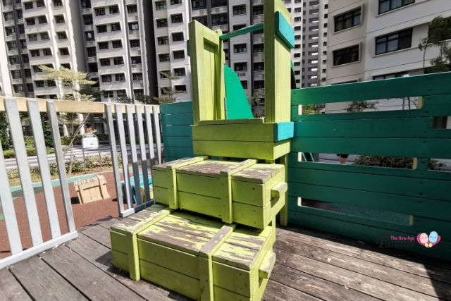 stacked crates to slide truck playground