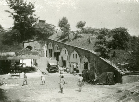 Soldiers playing badminton at Fort Siloso