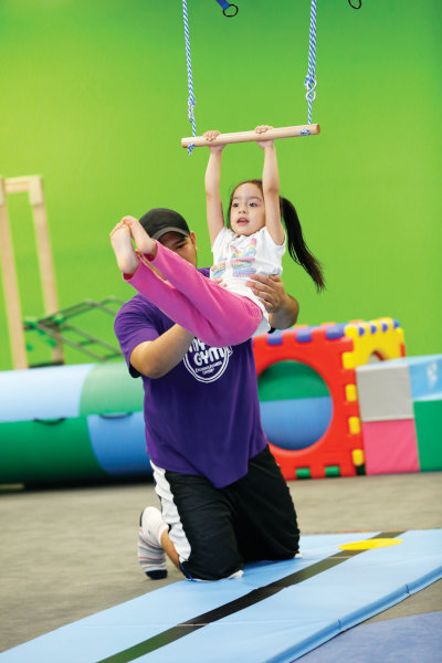 My Gym Girl on Trapeze with Teacher