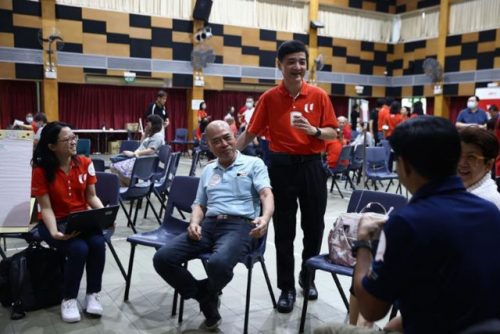 NTUC Deputy Secretary General engaging workers at a focus group discussion