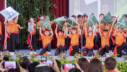 Students performing at Singapore Hokkien Huay Kuan's Dragon Boat Festival