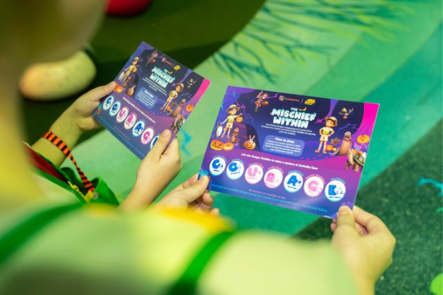 Curiosity Cove Halloween Quest Card